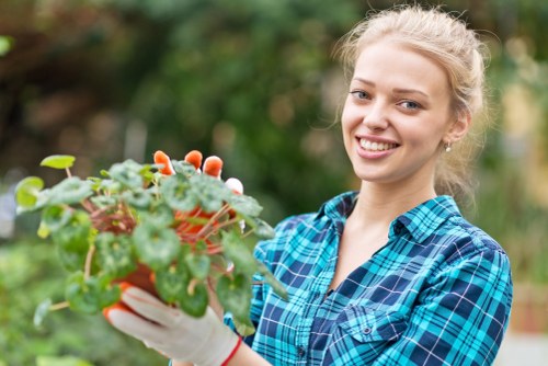 Professional garden clearance team working in Uxbridge garden