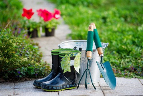 Lawn mower cutting healthy grass in a Uxbridge yard
