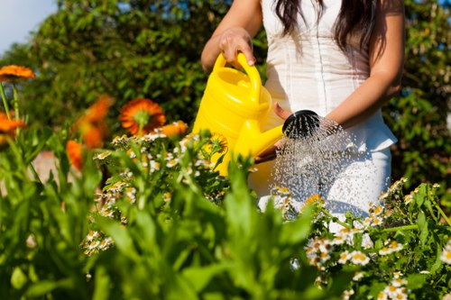 Professional gardeners tending to plants